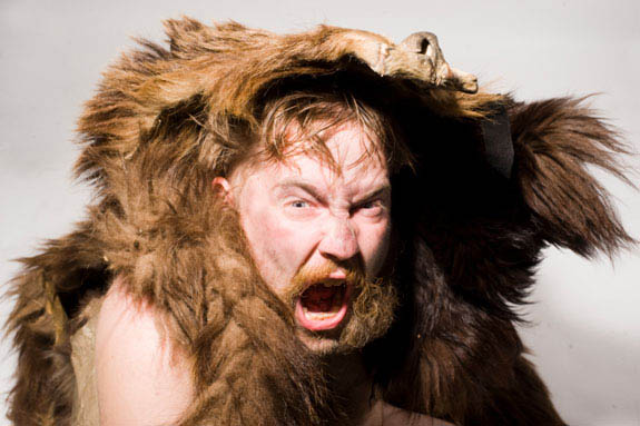 Caveman in bear skin