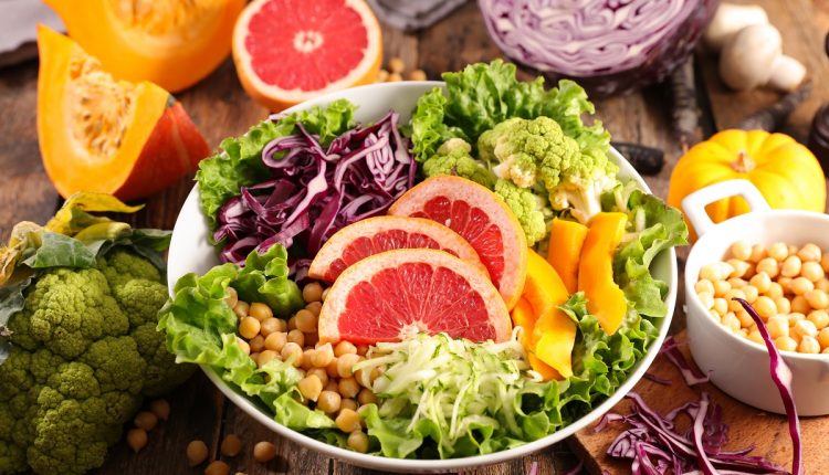 vegetarian salad bowl with lettuce, chickpea, grapefruit and cabbage