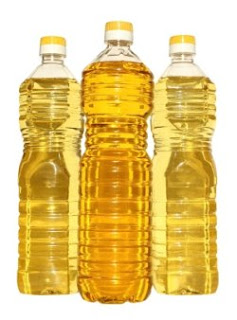 Bottle of vegetable oil on a white background.