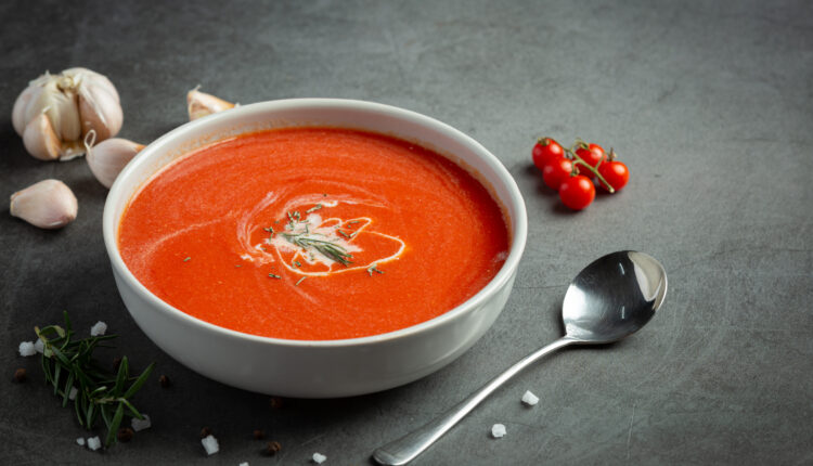 warm tomato soup serve in bowl